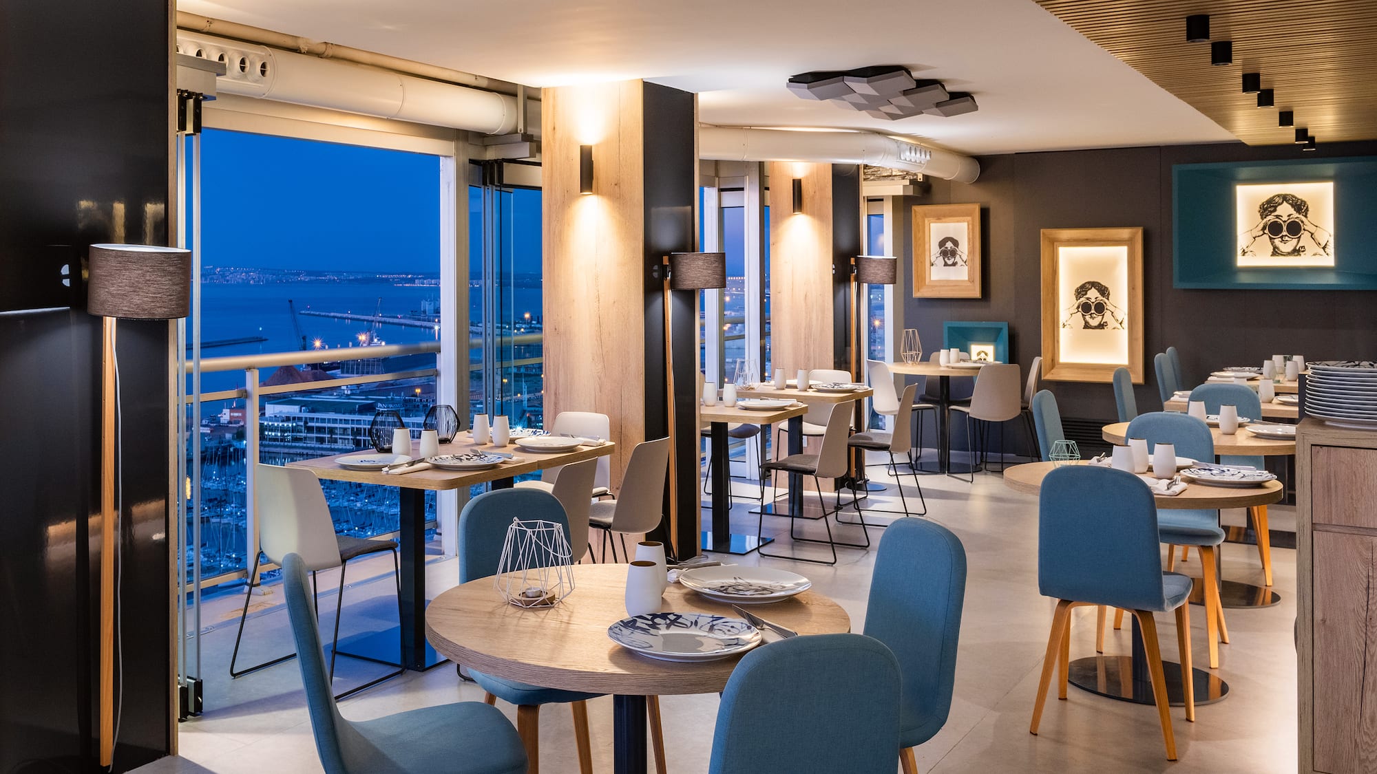 a restaurant with tables and chairs