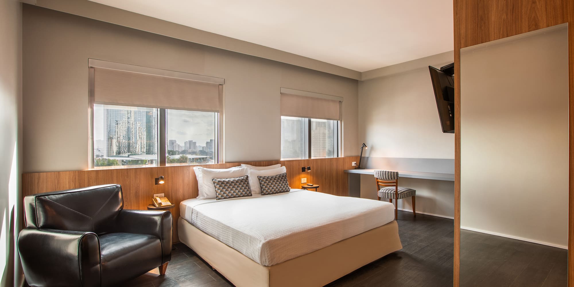 a room with a bed and a chair