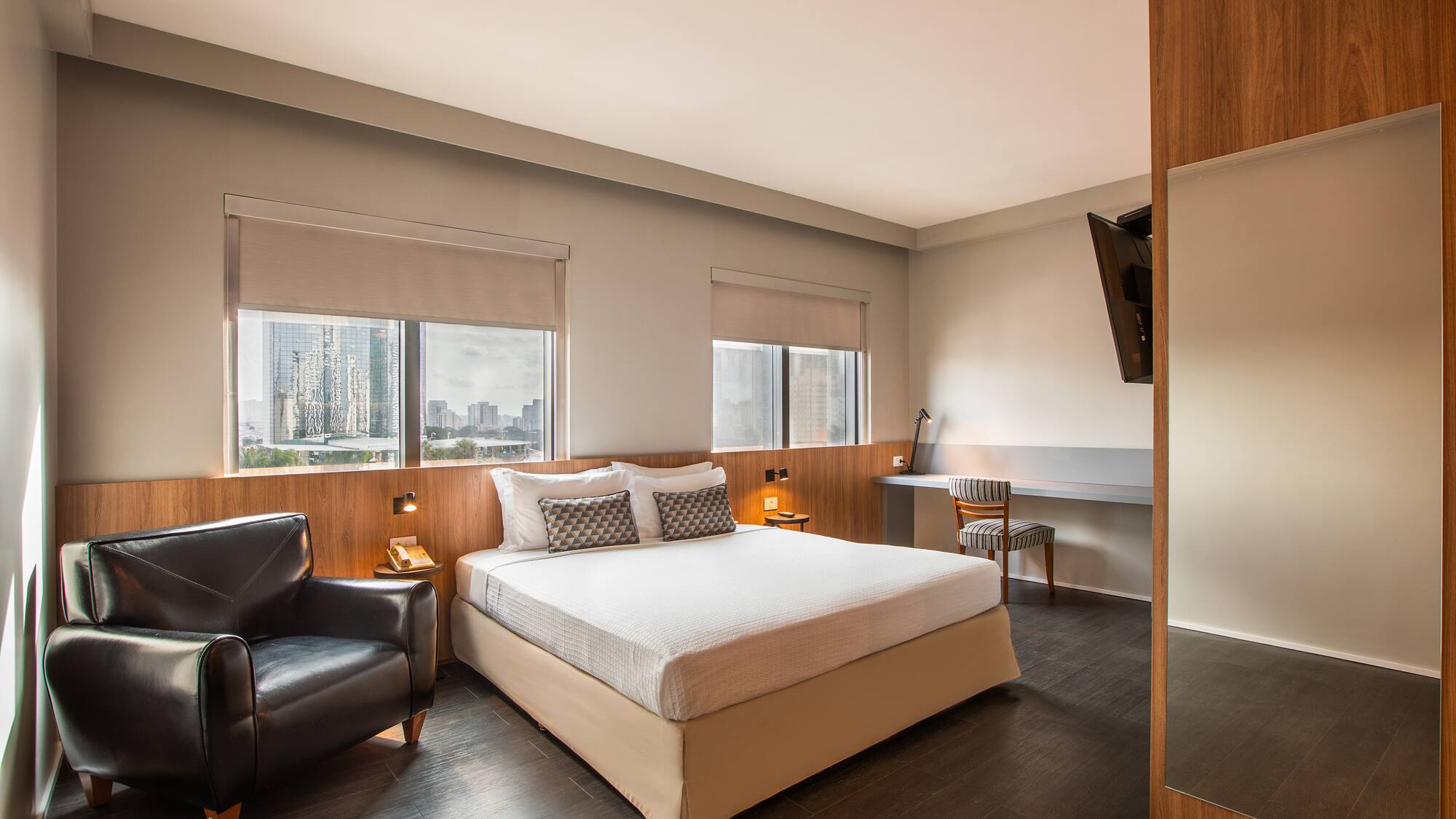 a room with a bed and a chair