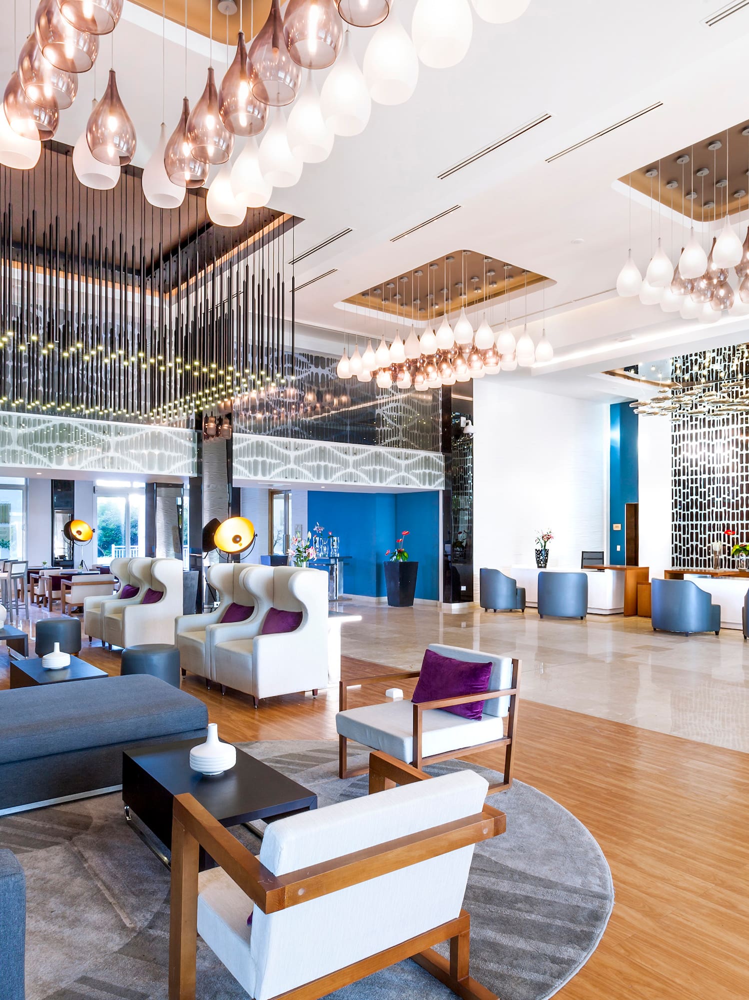 a large room with a large sofa and chairs