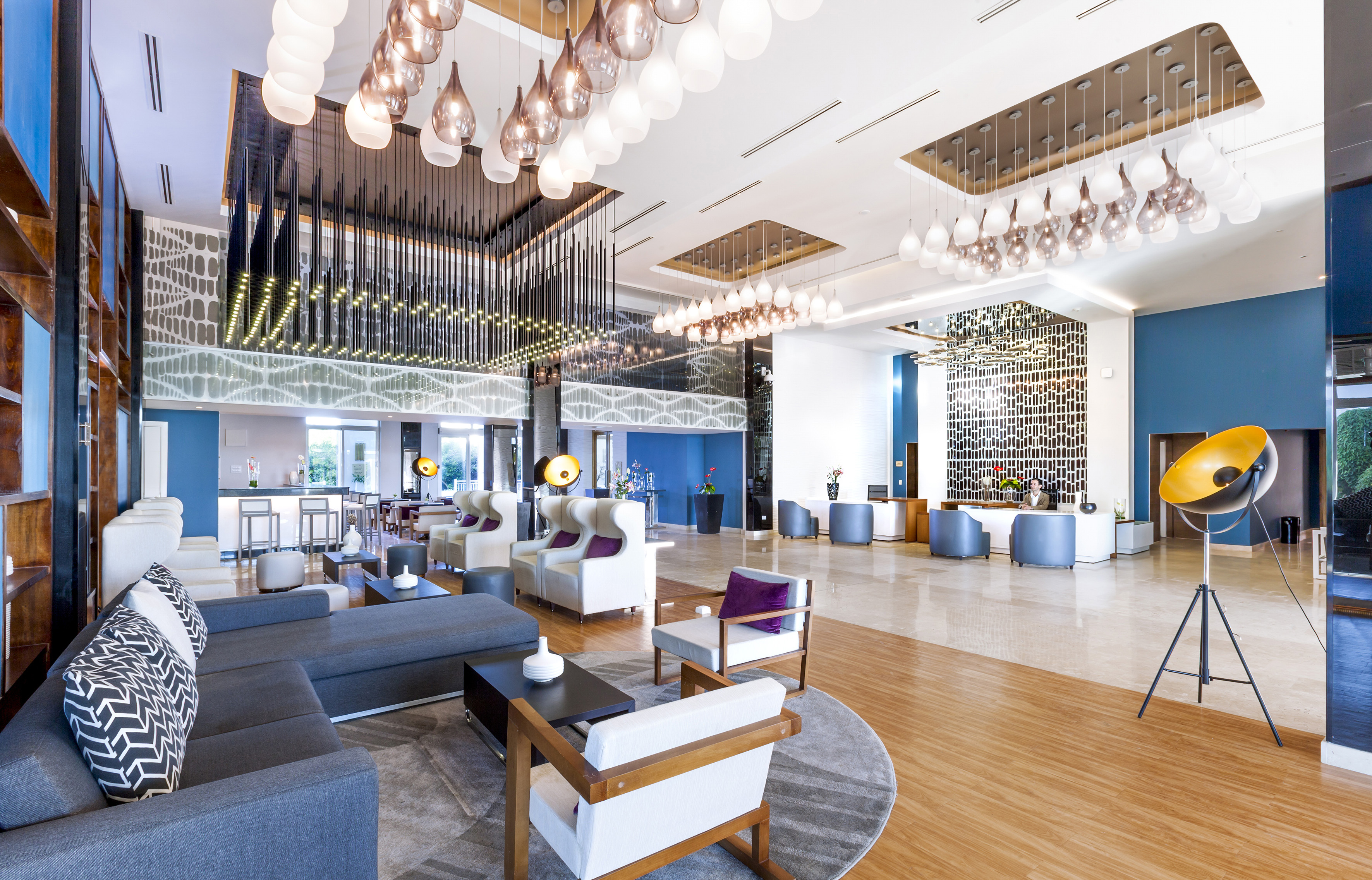 a large room with a large sofa and chairs