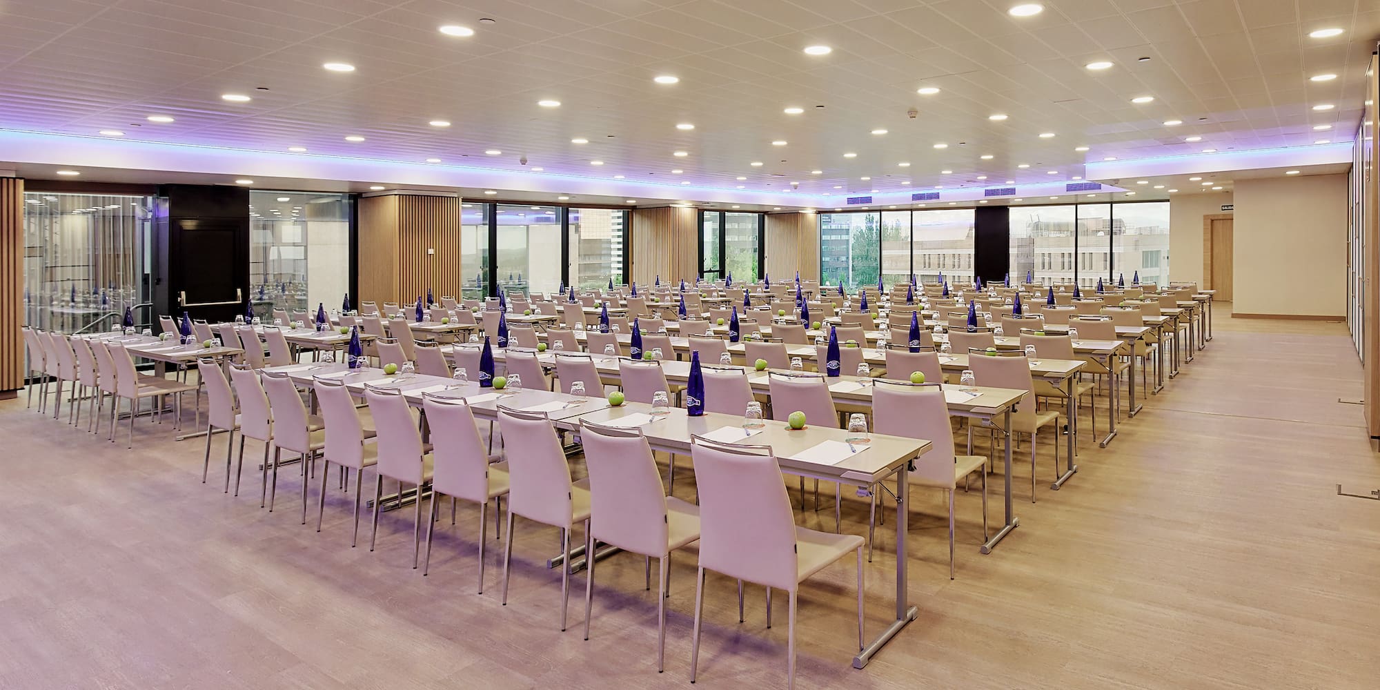 a large room with tables and chairs