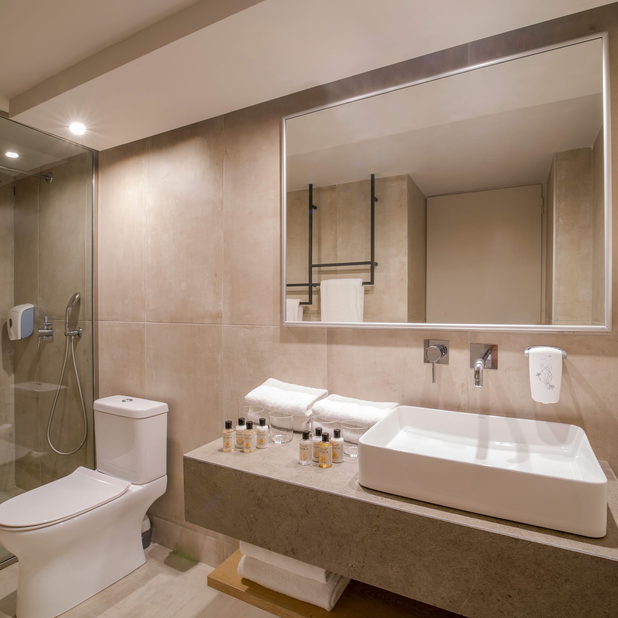 a bathroom with a mirror and sink