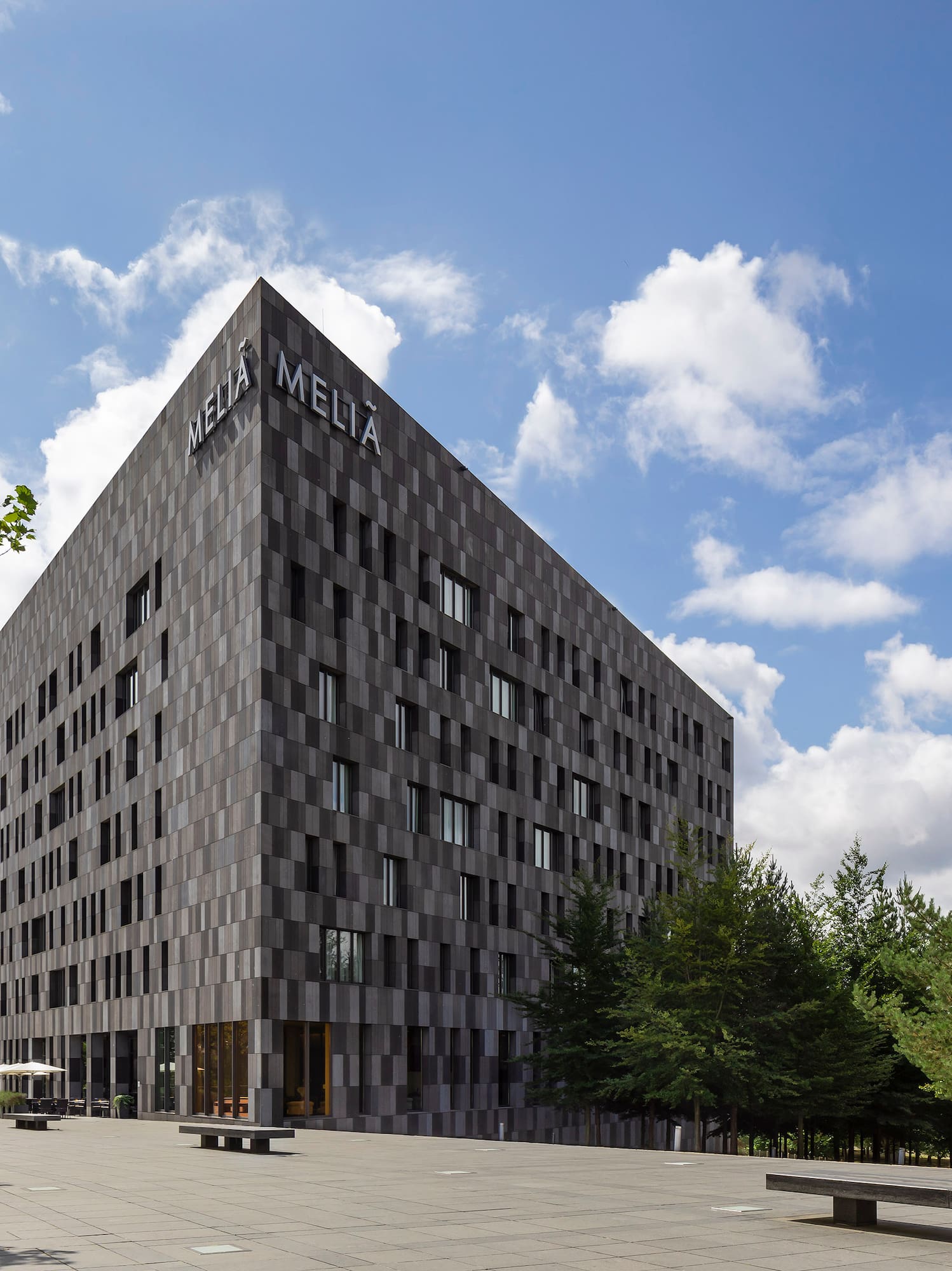 a building with trees around it