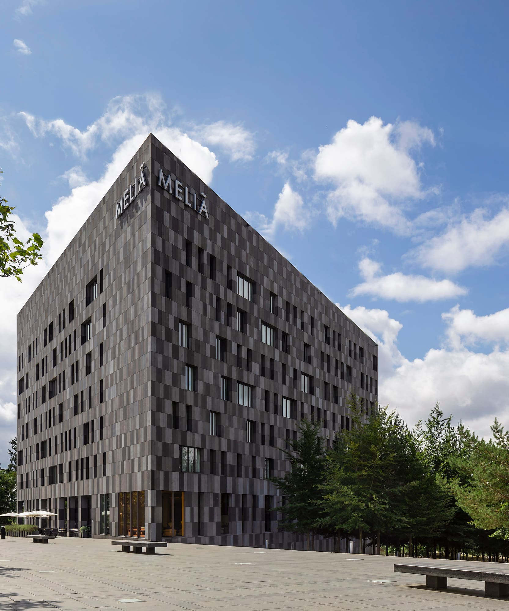 a building with trees around it