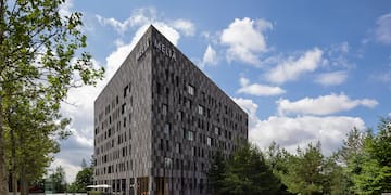 a building with trees around it