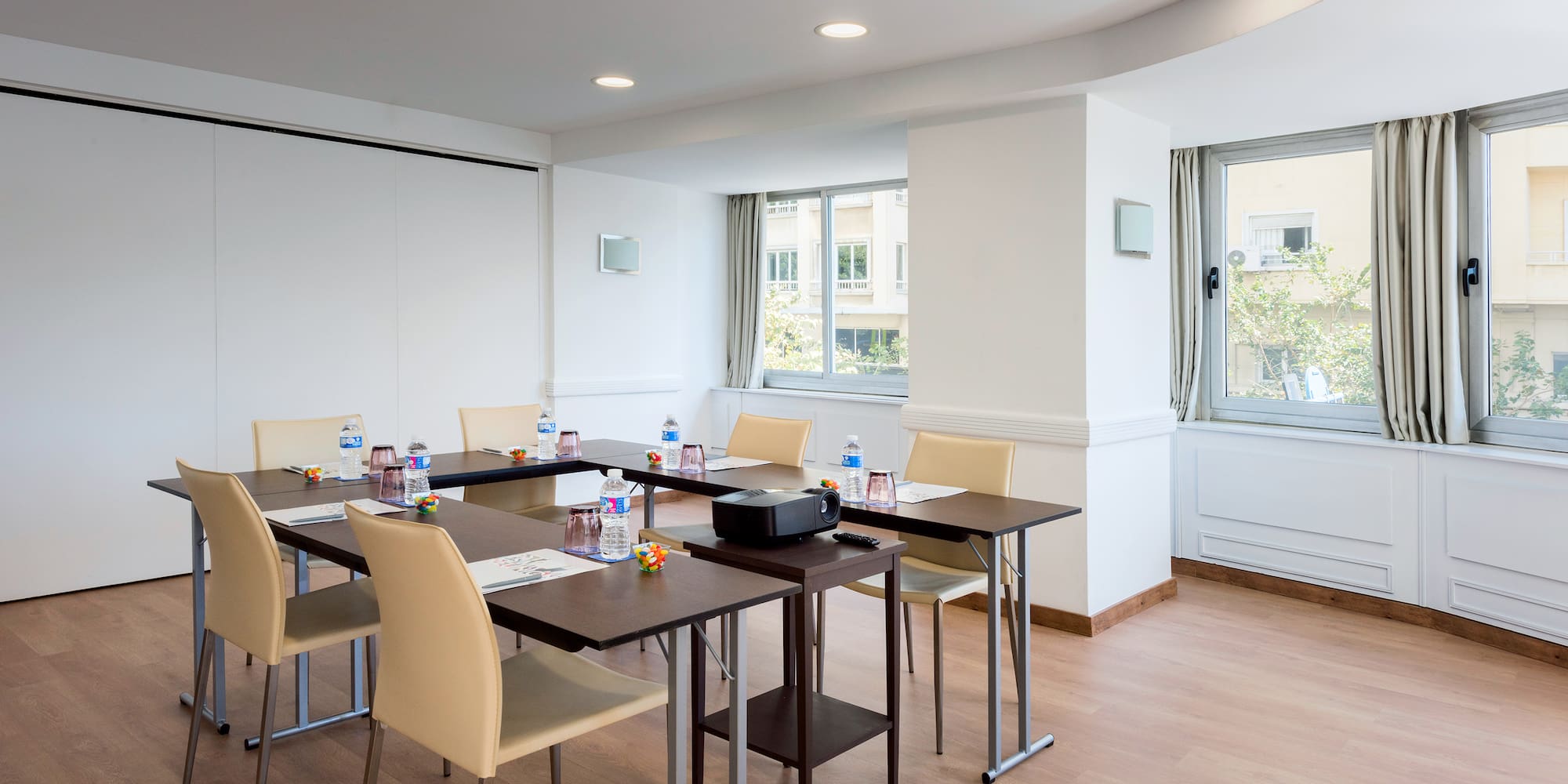 a room with tables and chairs