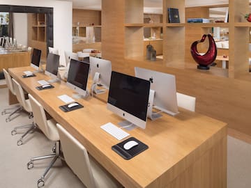 a desk with computers on it
