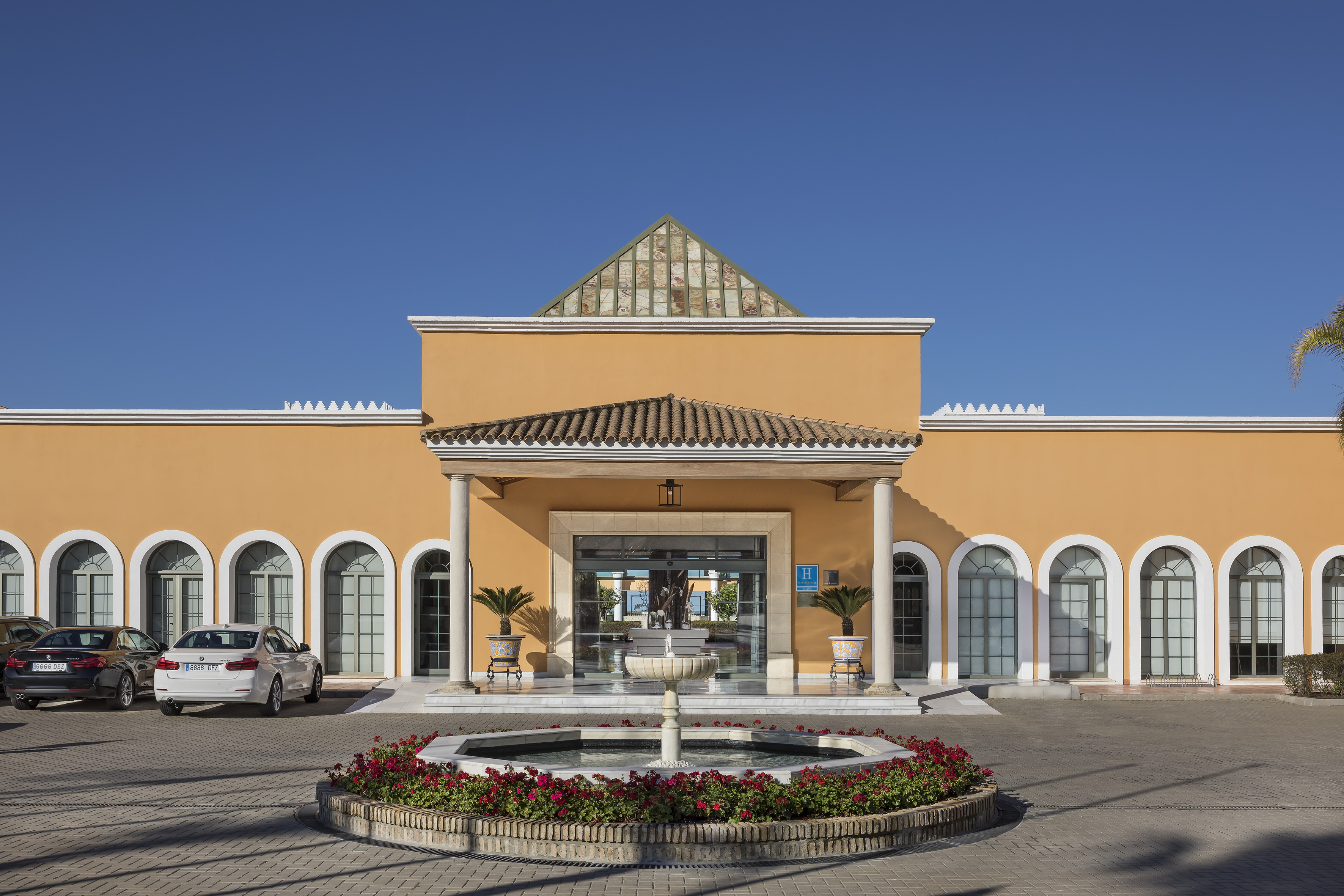a building with a fountain in front of it