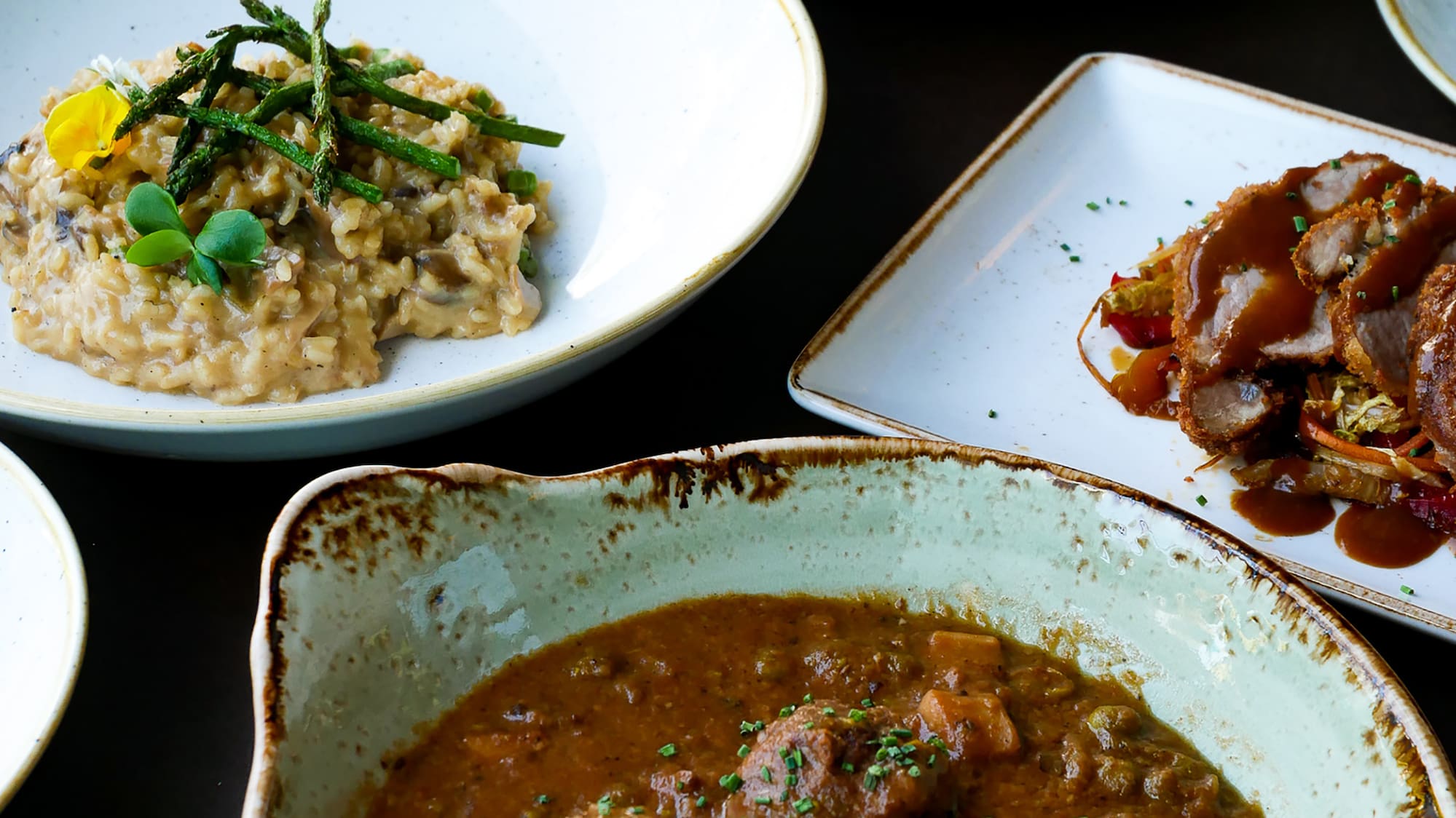 a table full of plates of food