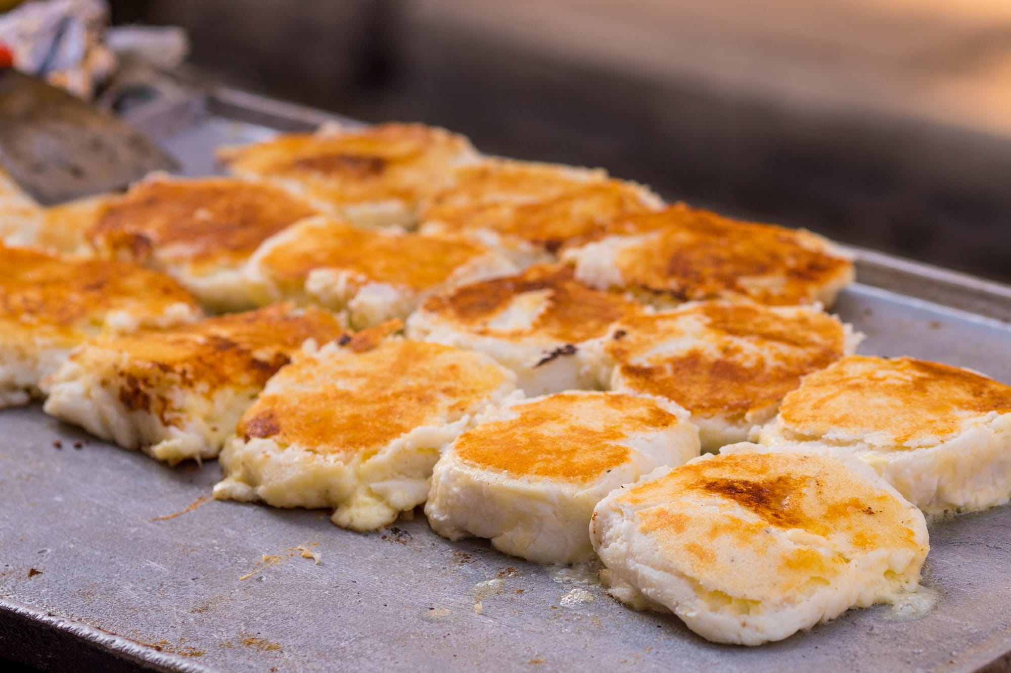 a group of food on a metal surface