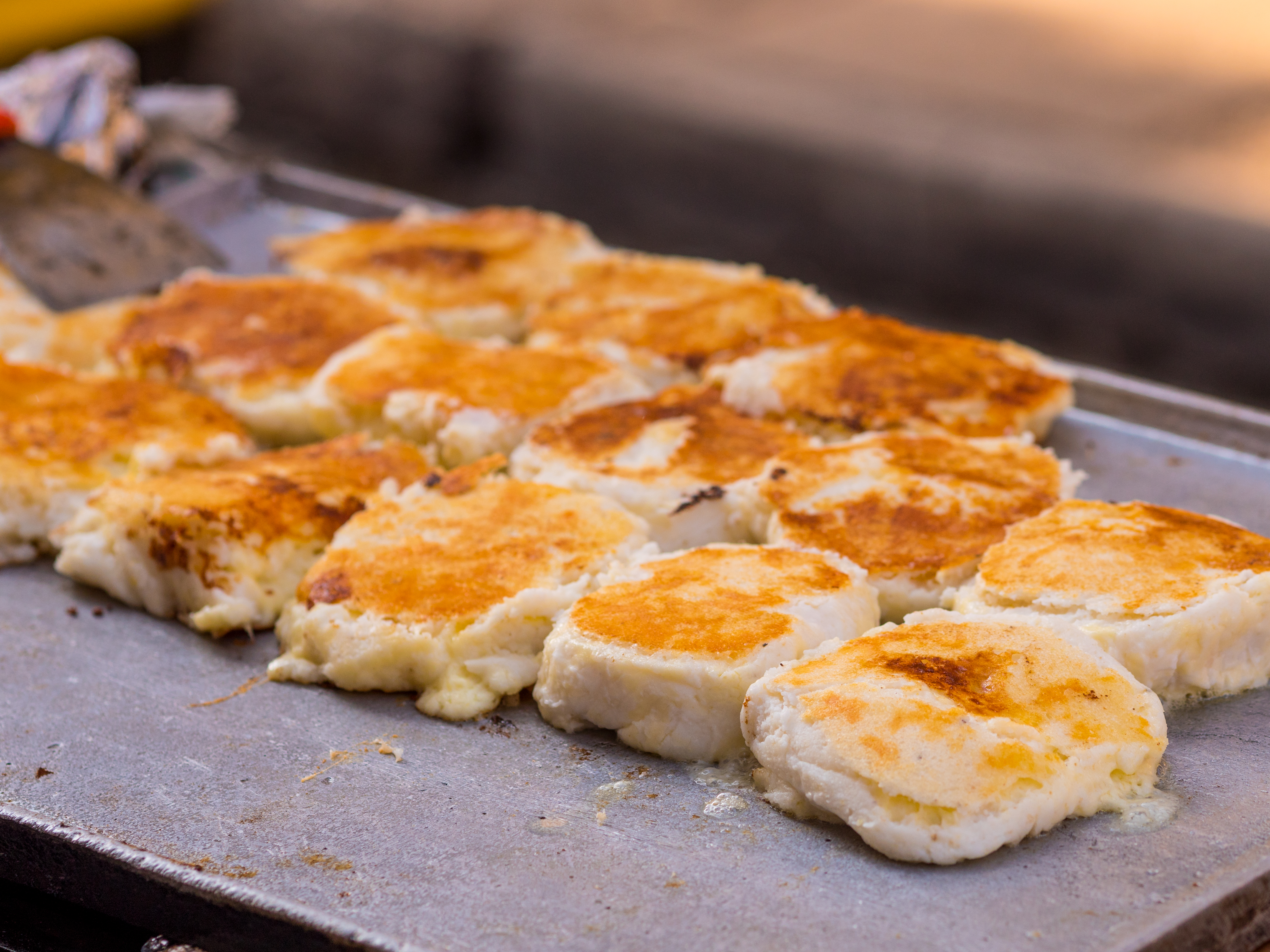a group of food on a metal surface