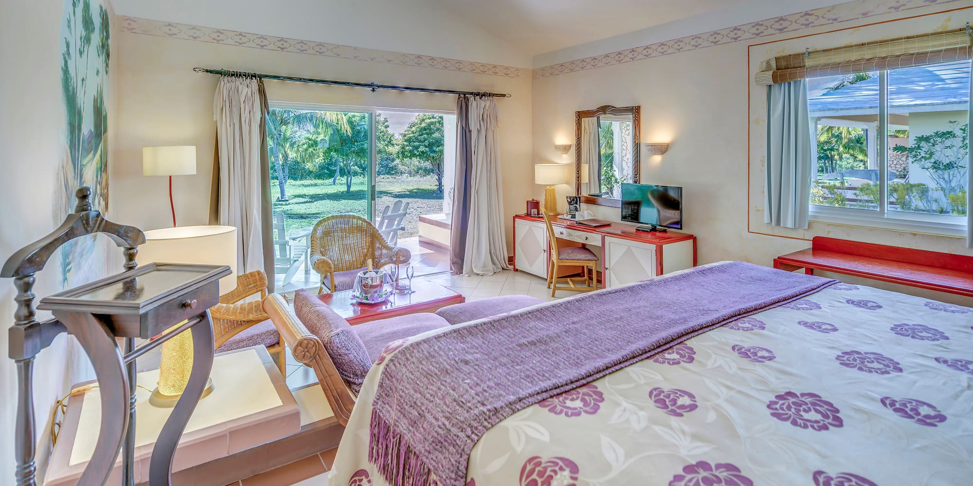 a bedroom with a bed and a desk