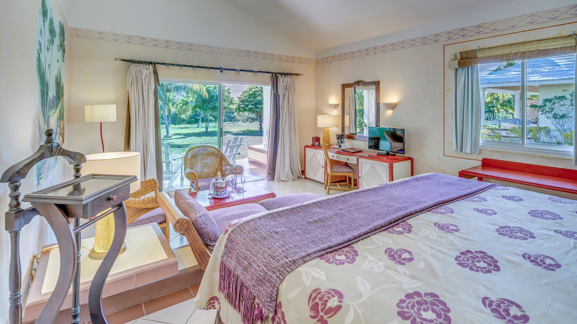 a bedroom with a bed and a desk