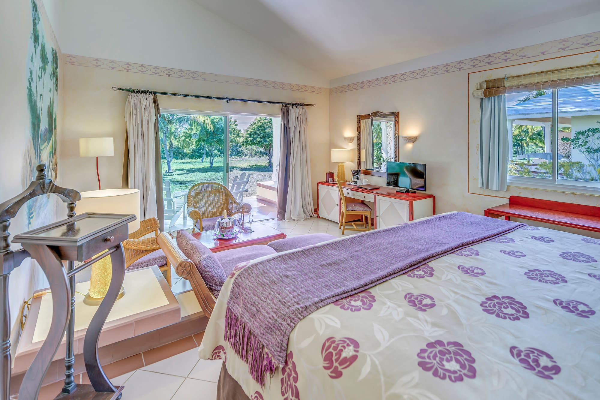 a bedroom with a bed and a desk