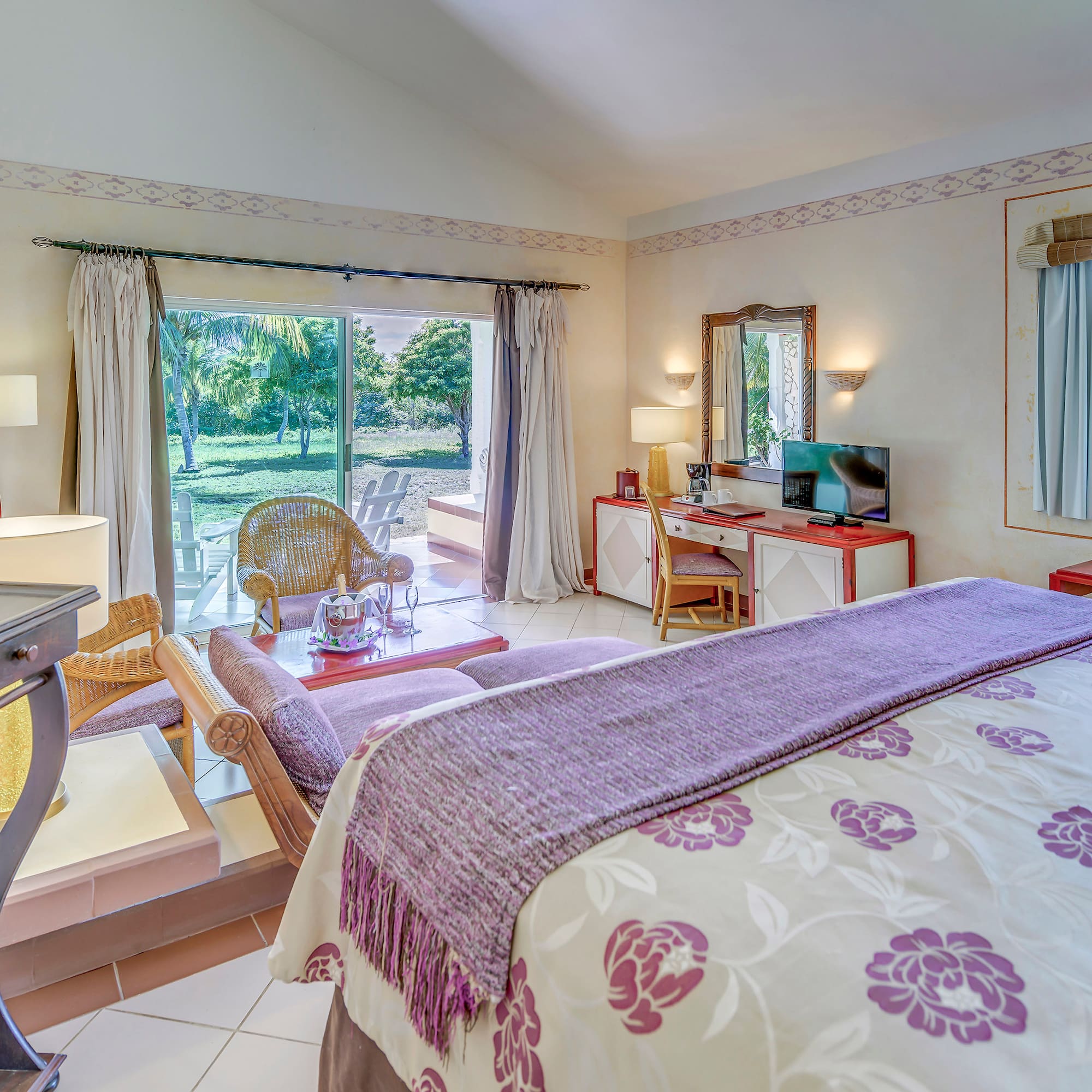 a bedroom with a bed and a desk