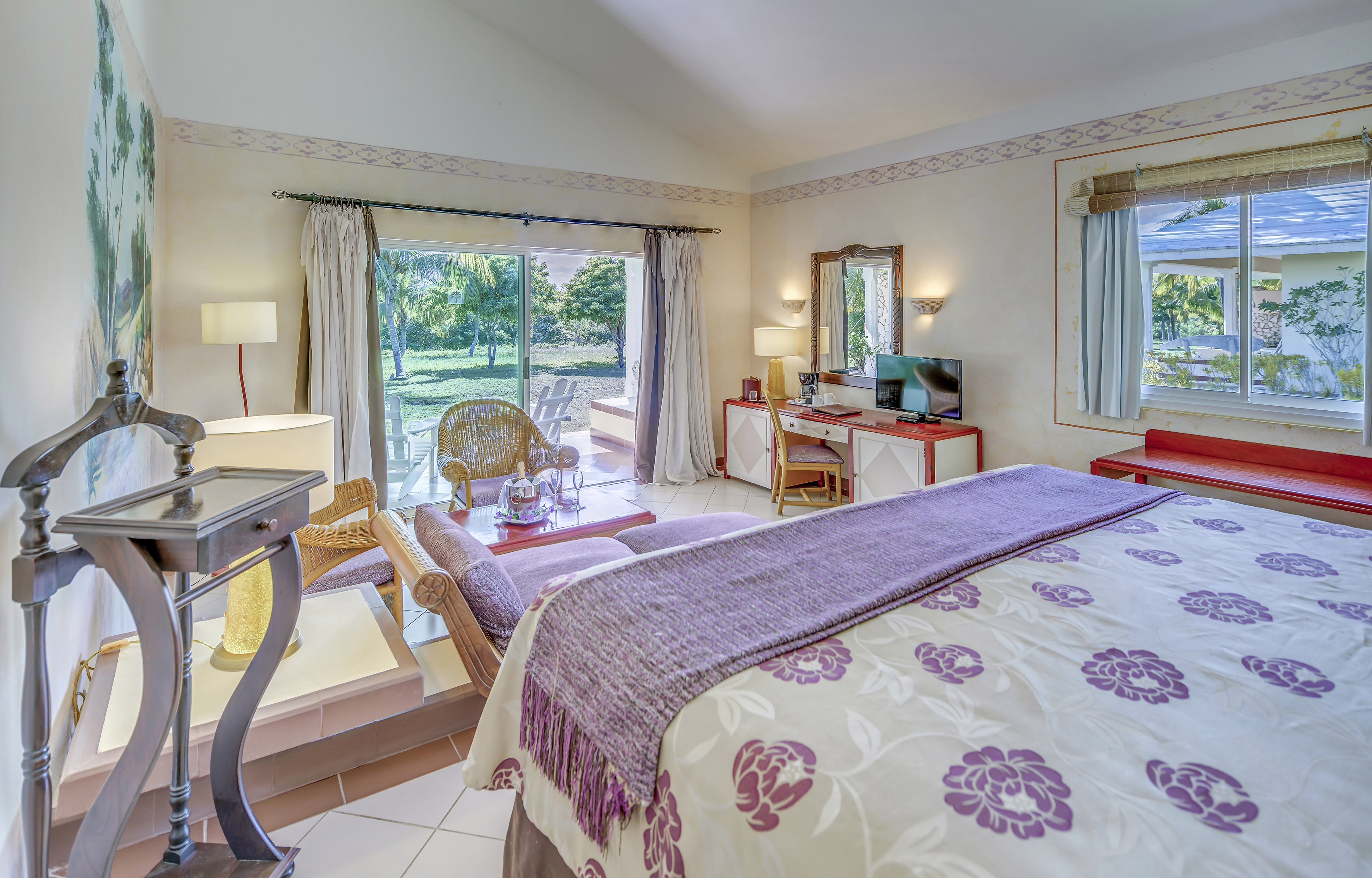 a bedroom with a bed and a desk