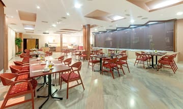 a room with tables and chairs