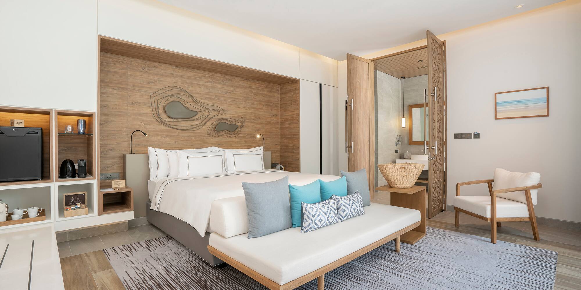 a bedroom with a bed and a fan