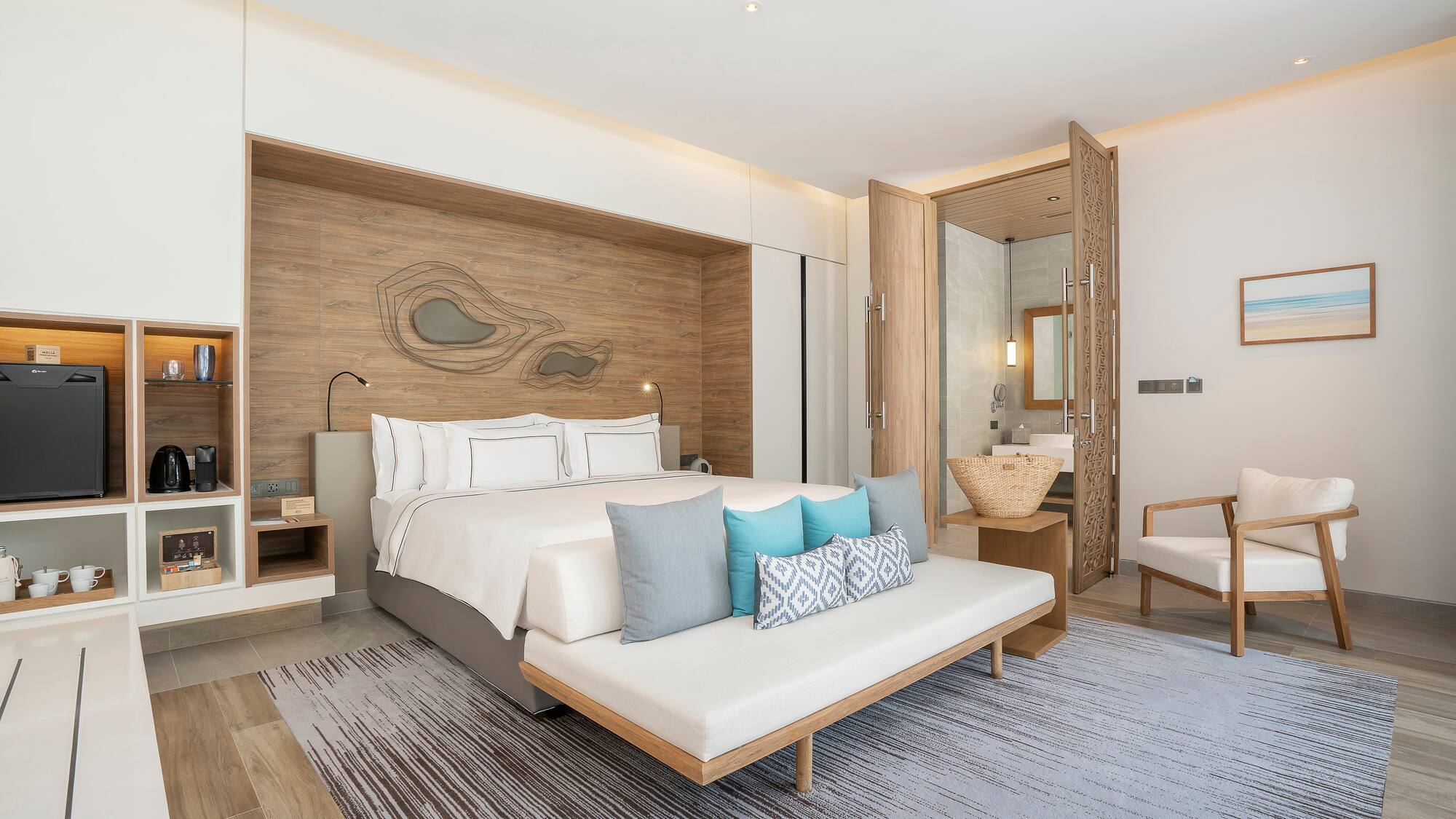 a bedroom with a bed and a fan