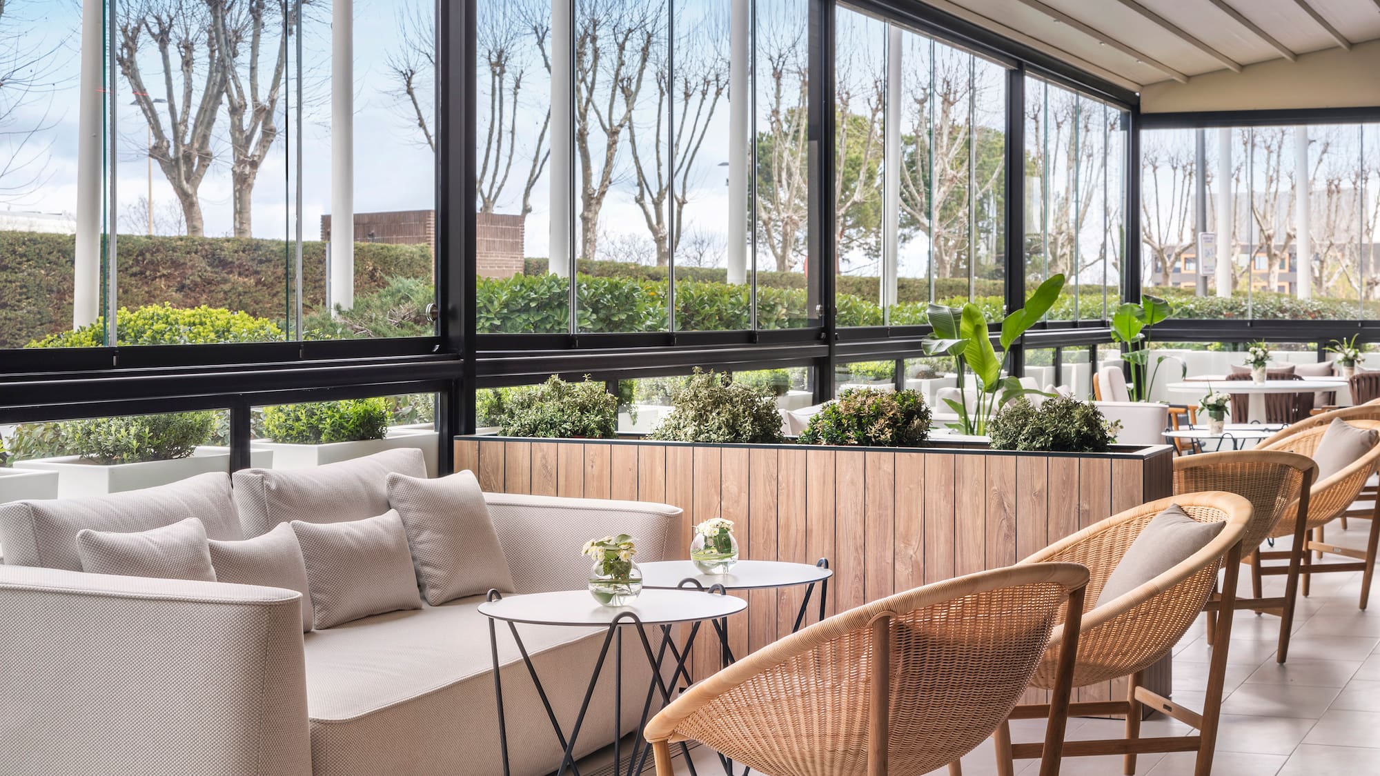 a room with a couch and chairs