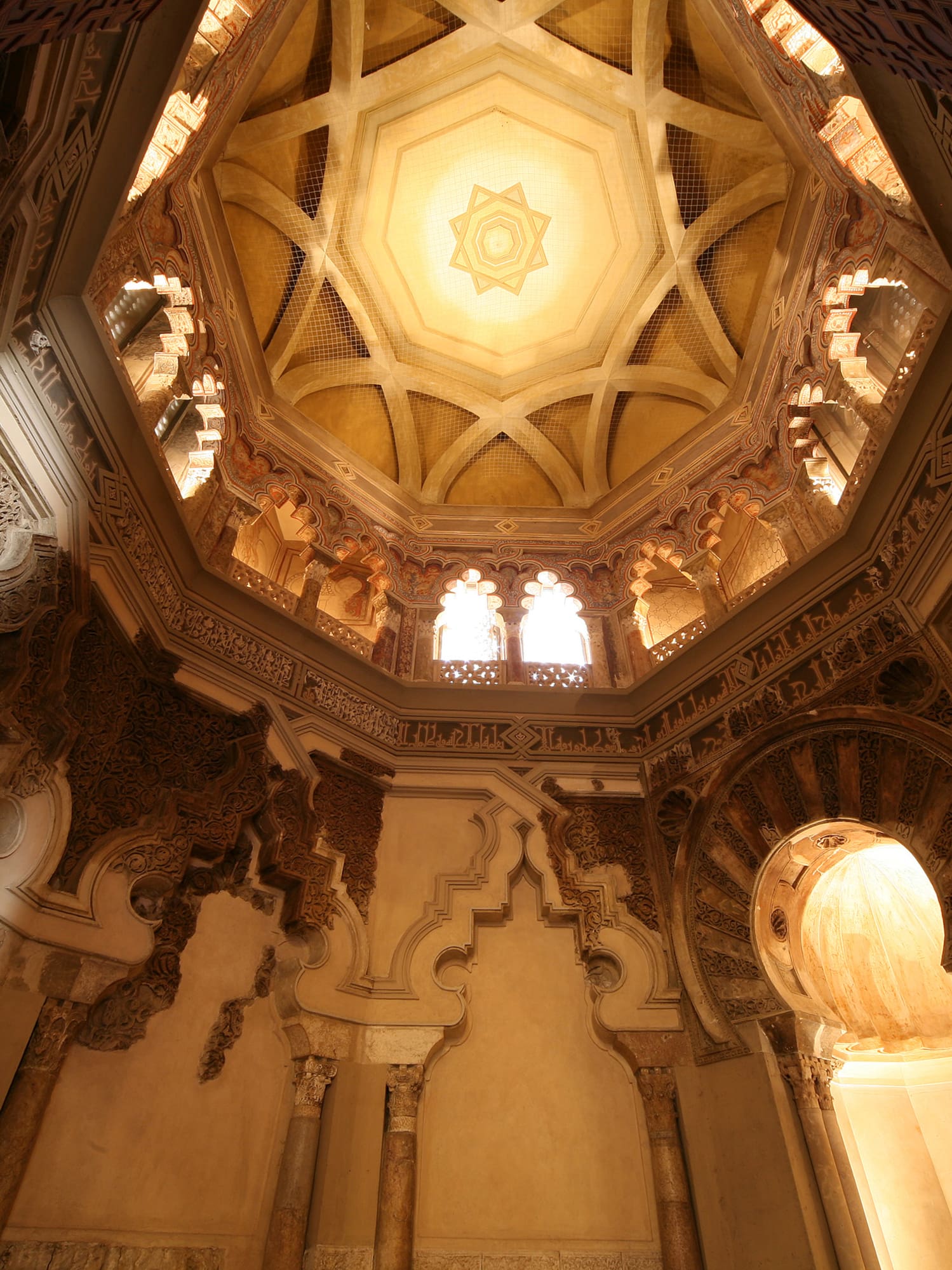 a ceiling with ornate carvings