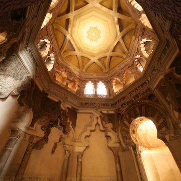 a ceiling with ornate carvings