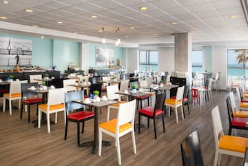 a room with tables and chairs