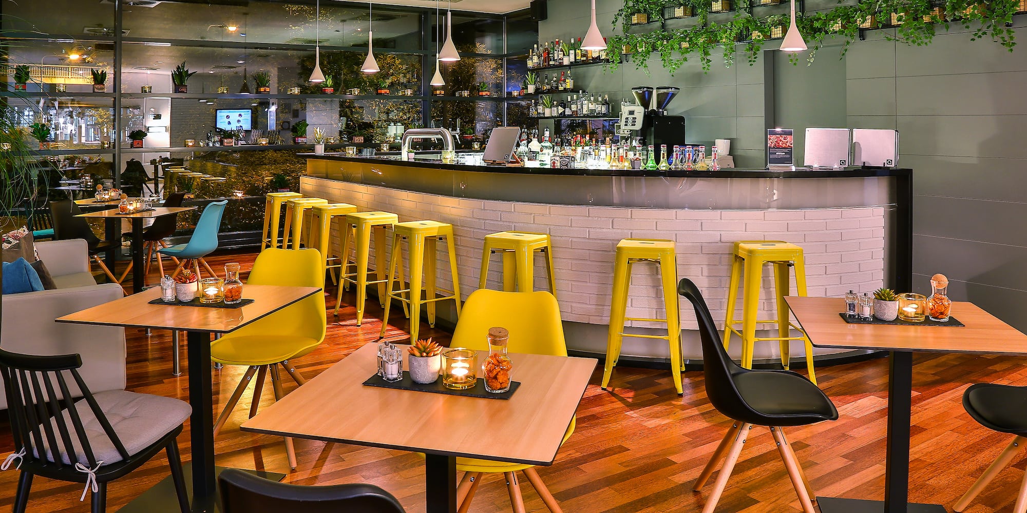 a restaurant with tables and chairs