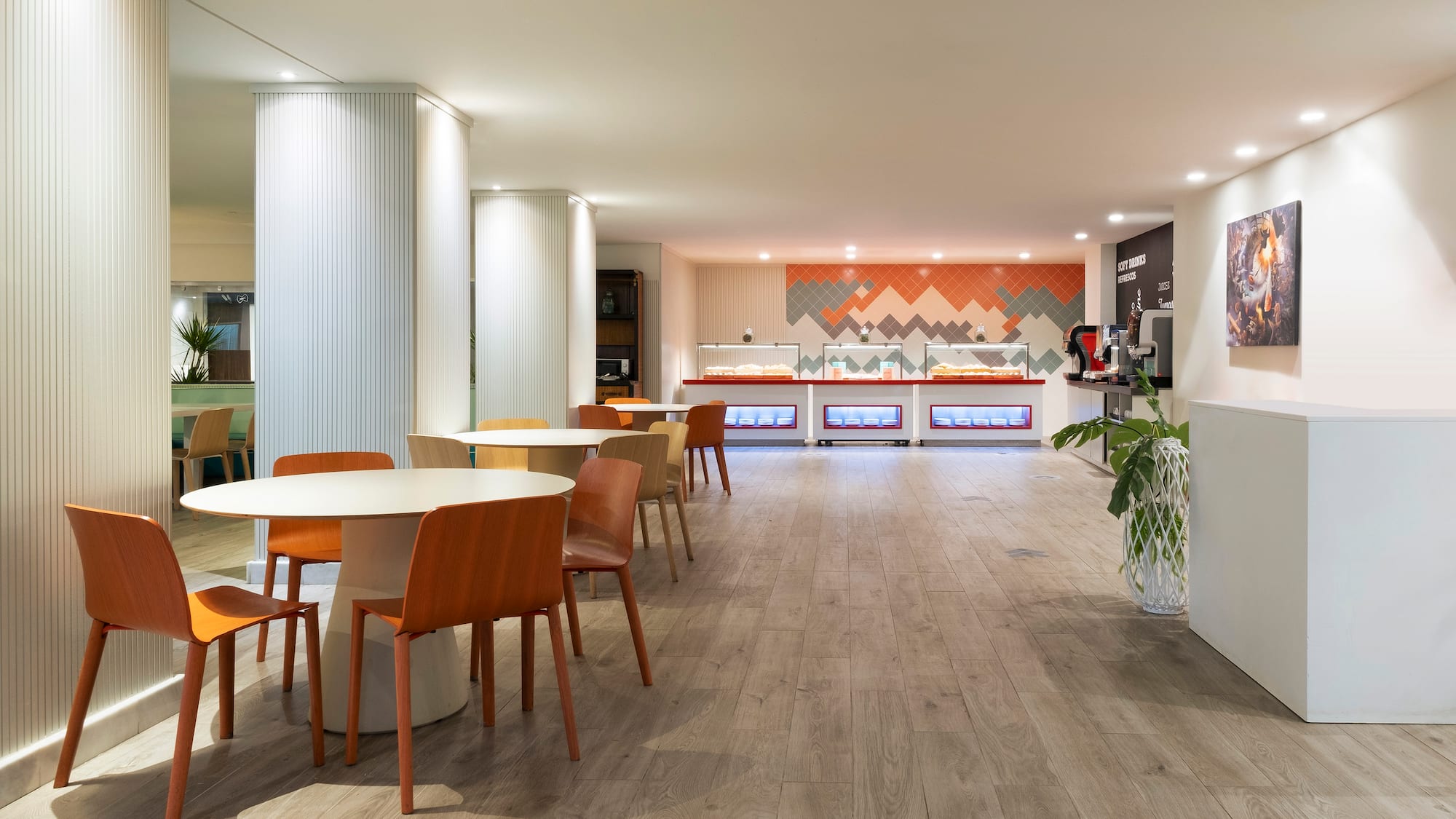 a room with tables and chairs