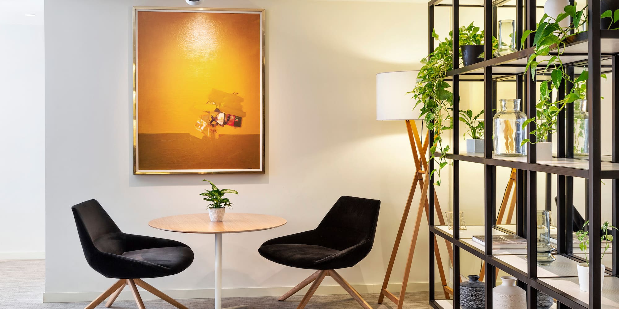 a room with a table and chairs