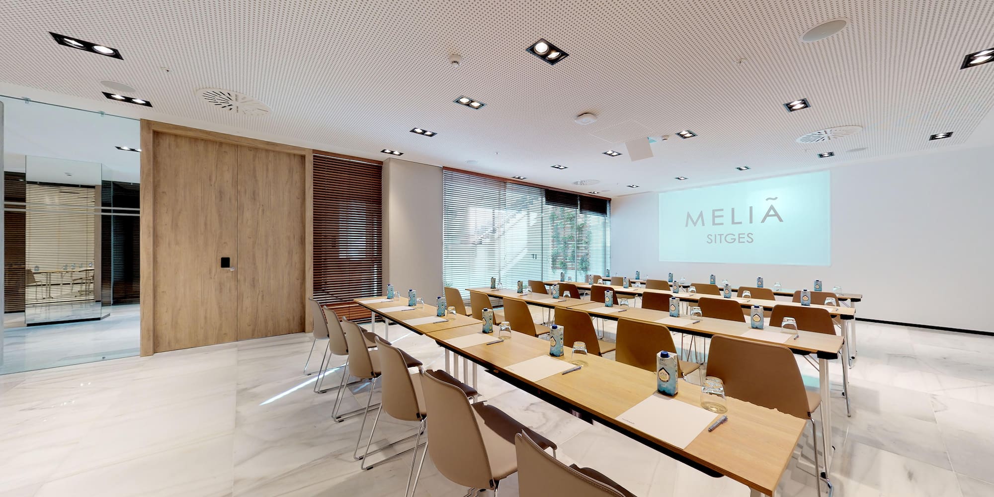 a room with tables and chairs