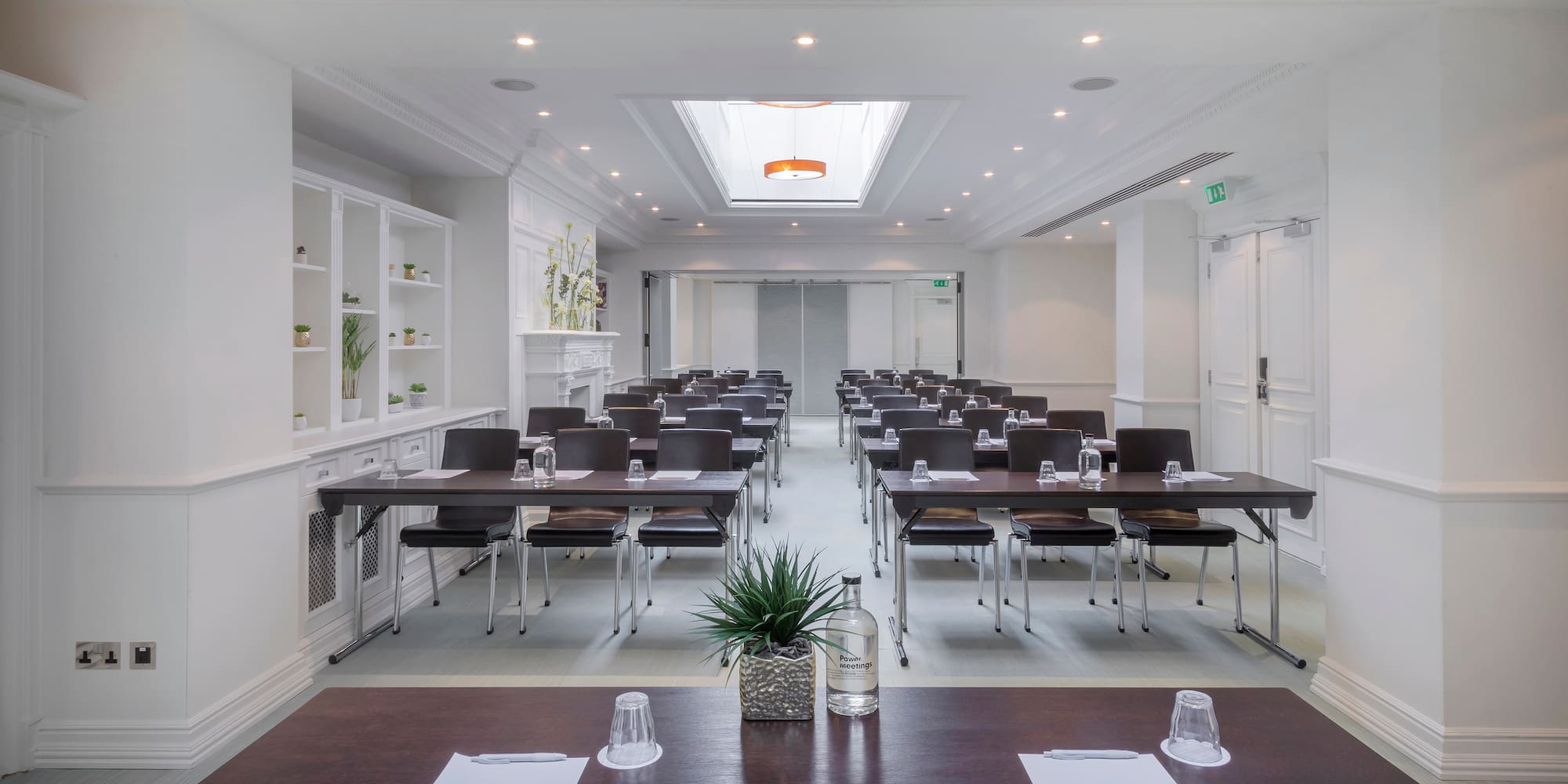 a room with tables and chairs