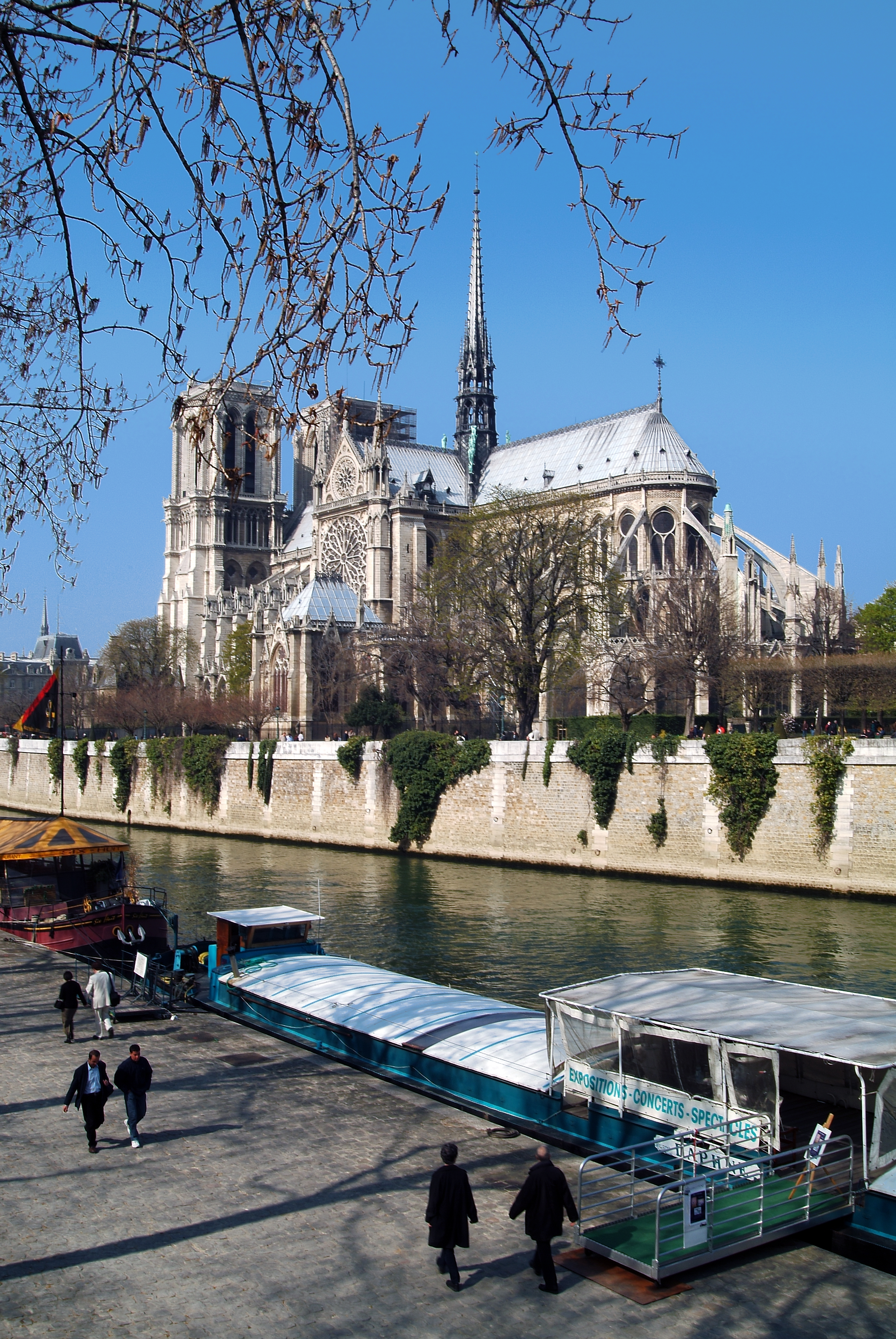 a boat on the water next to a building