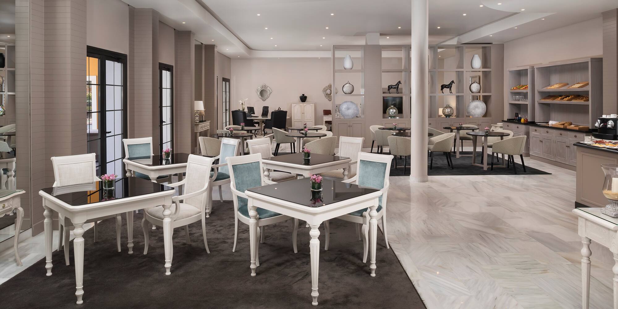 a room with tables and chairs