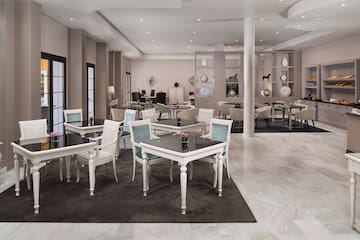 a room with tables and chairs
