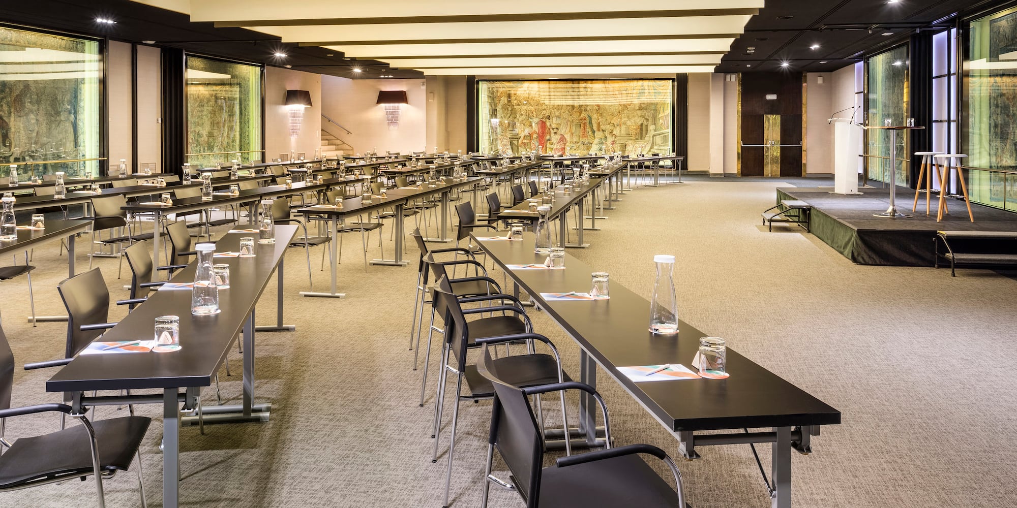 a room with tables and chairs