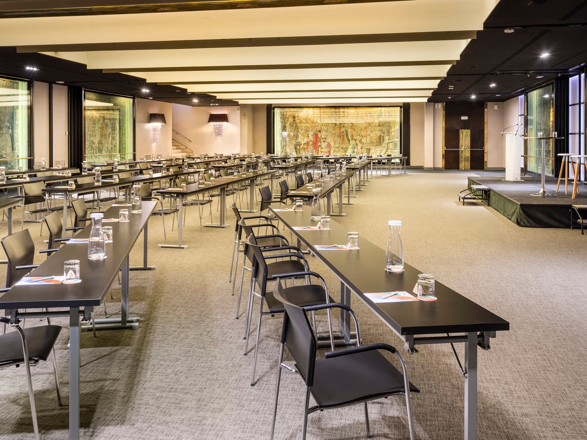 a room with tables and chairs