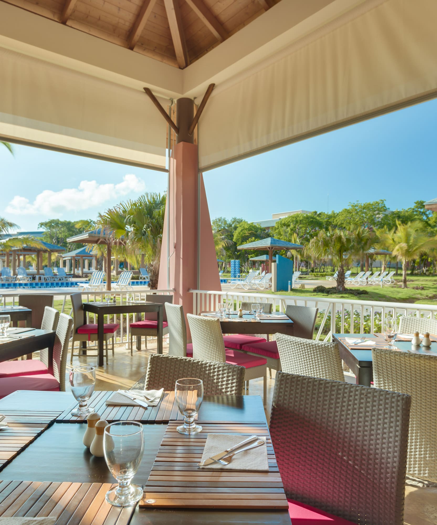 a restaurant with tables and chairs