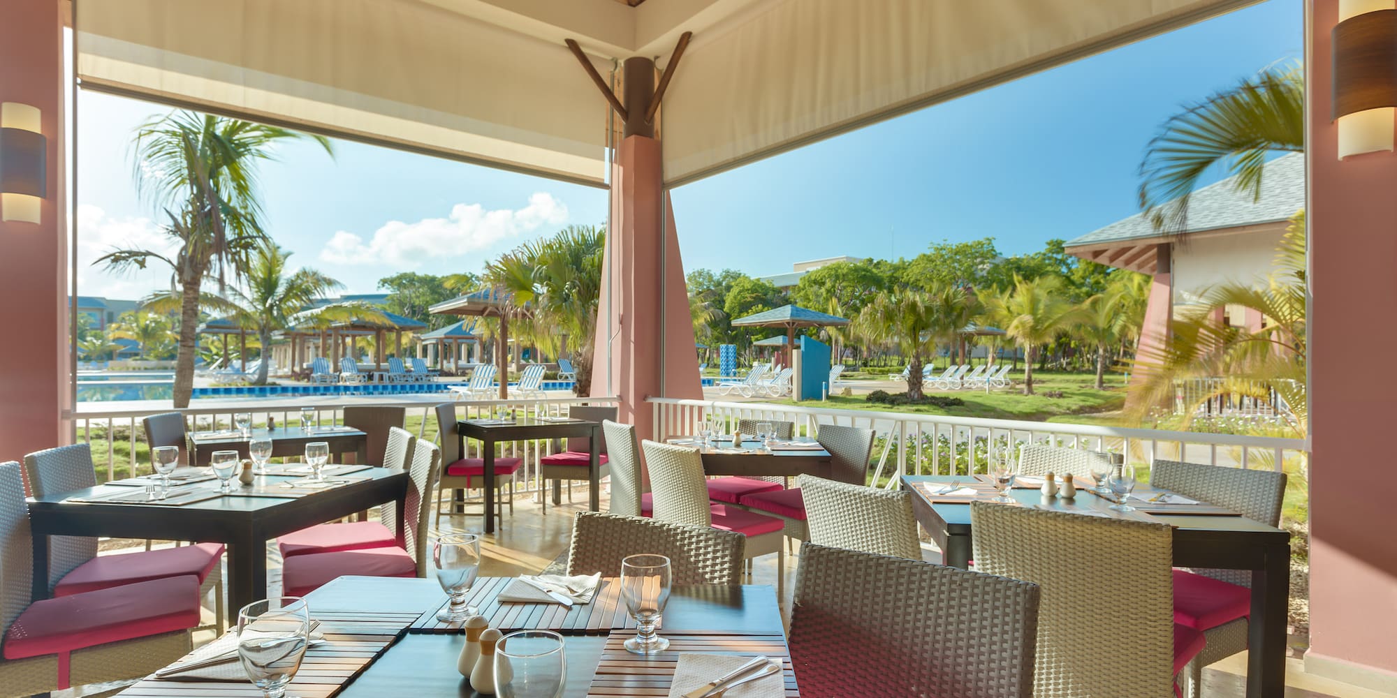 a restaurant with tables and chairs