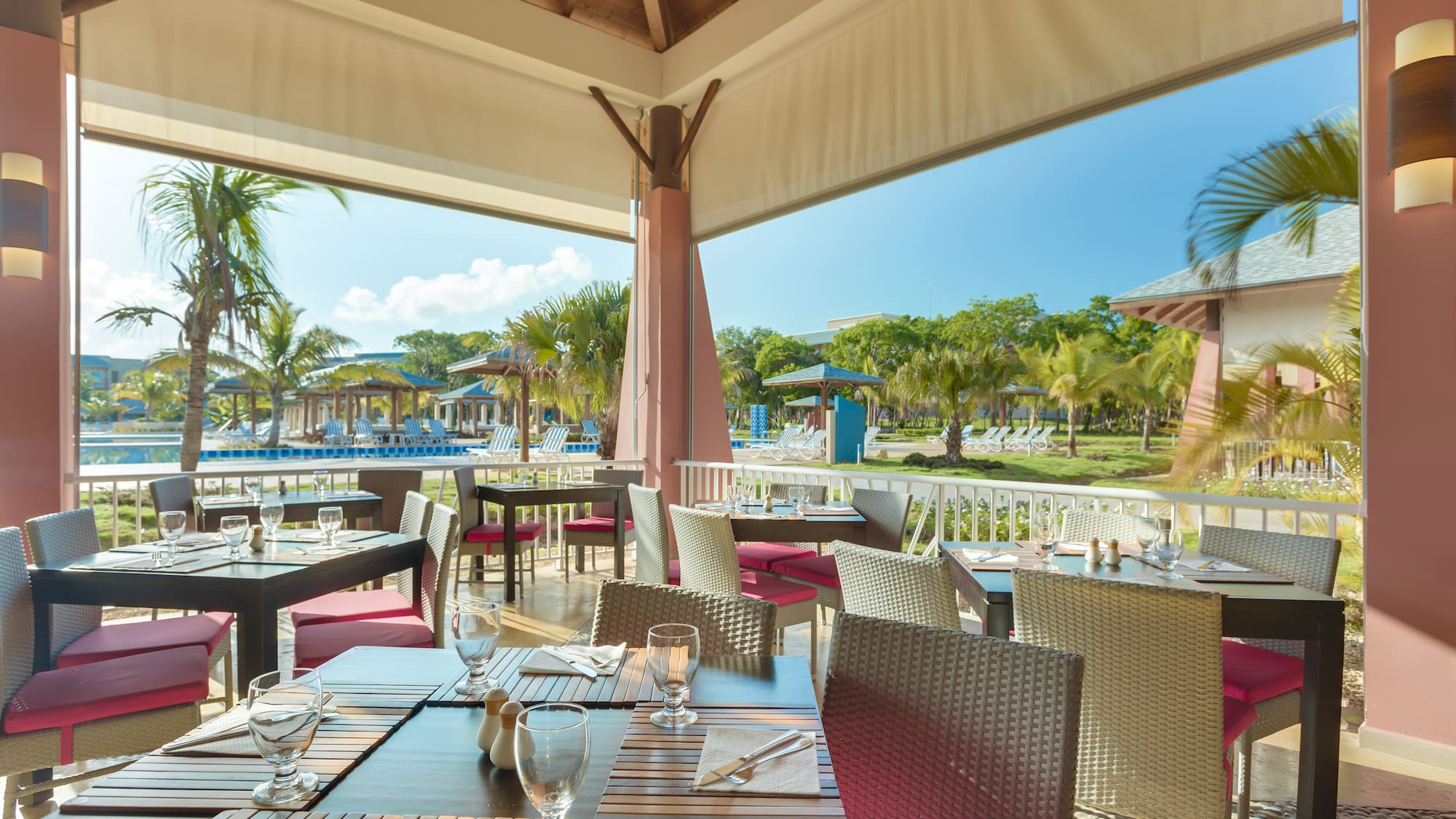a restaurant with tables and chairs