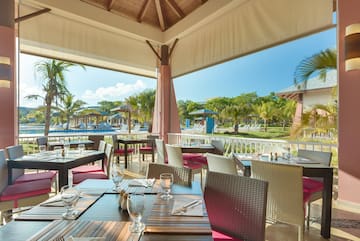 a restaurant with tables and chairs