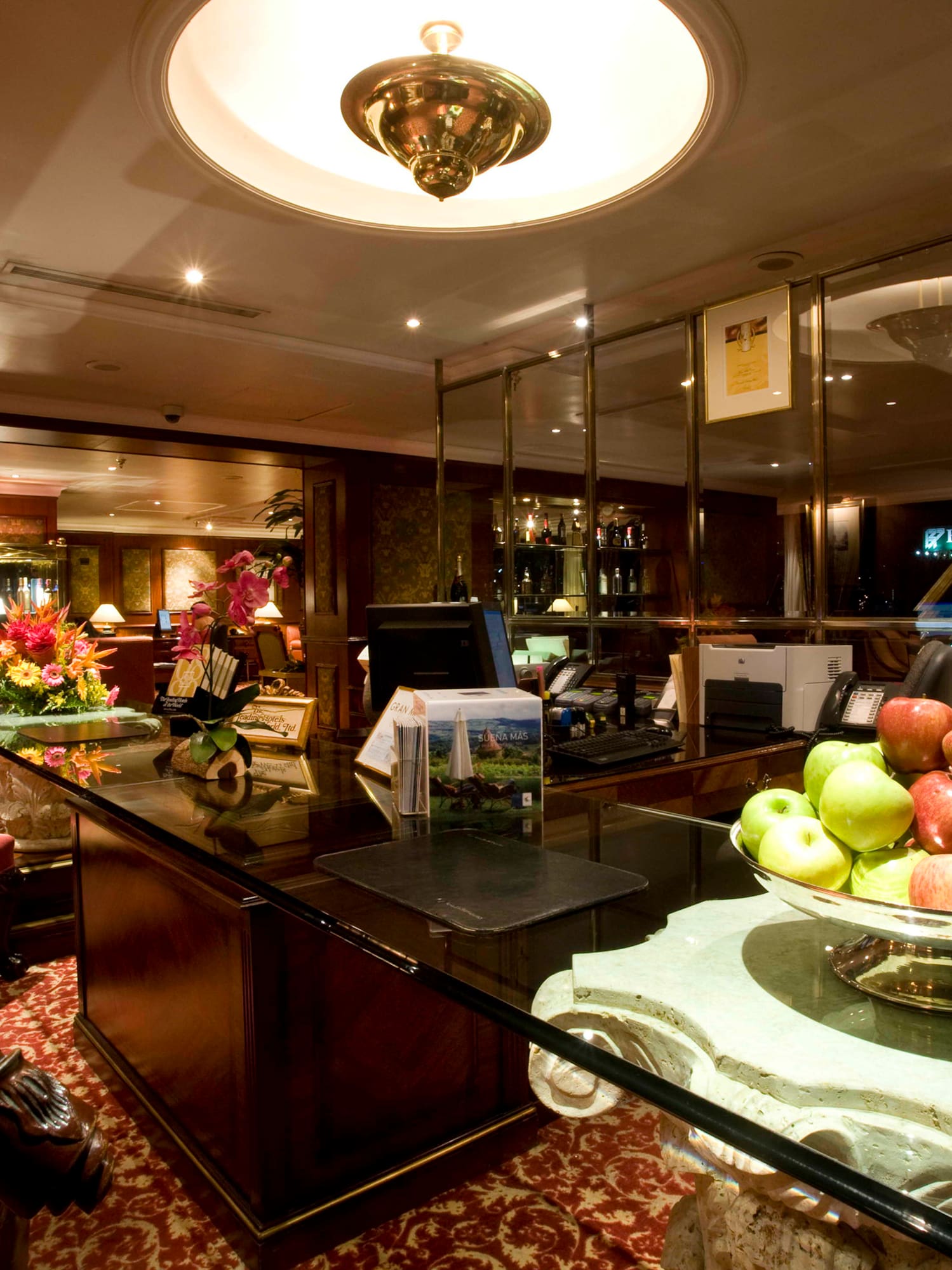 a fruit bowl on a counter in a room