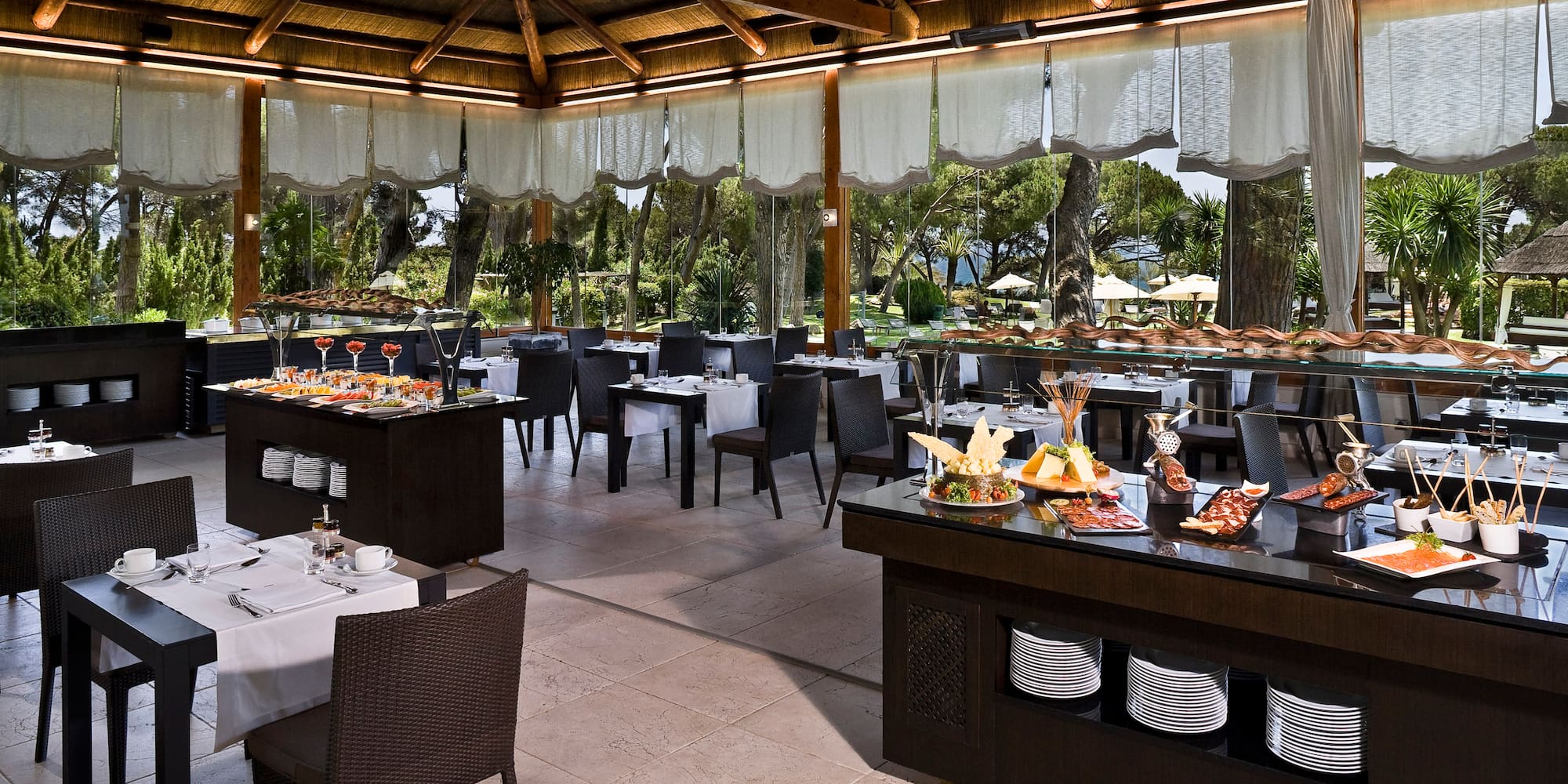 a restaurant with tables and chairs