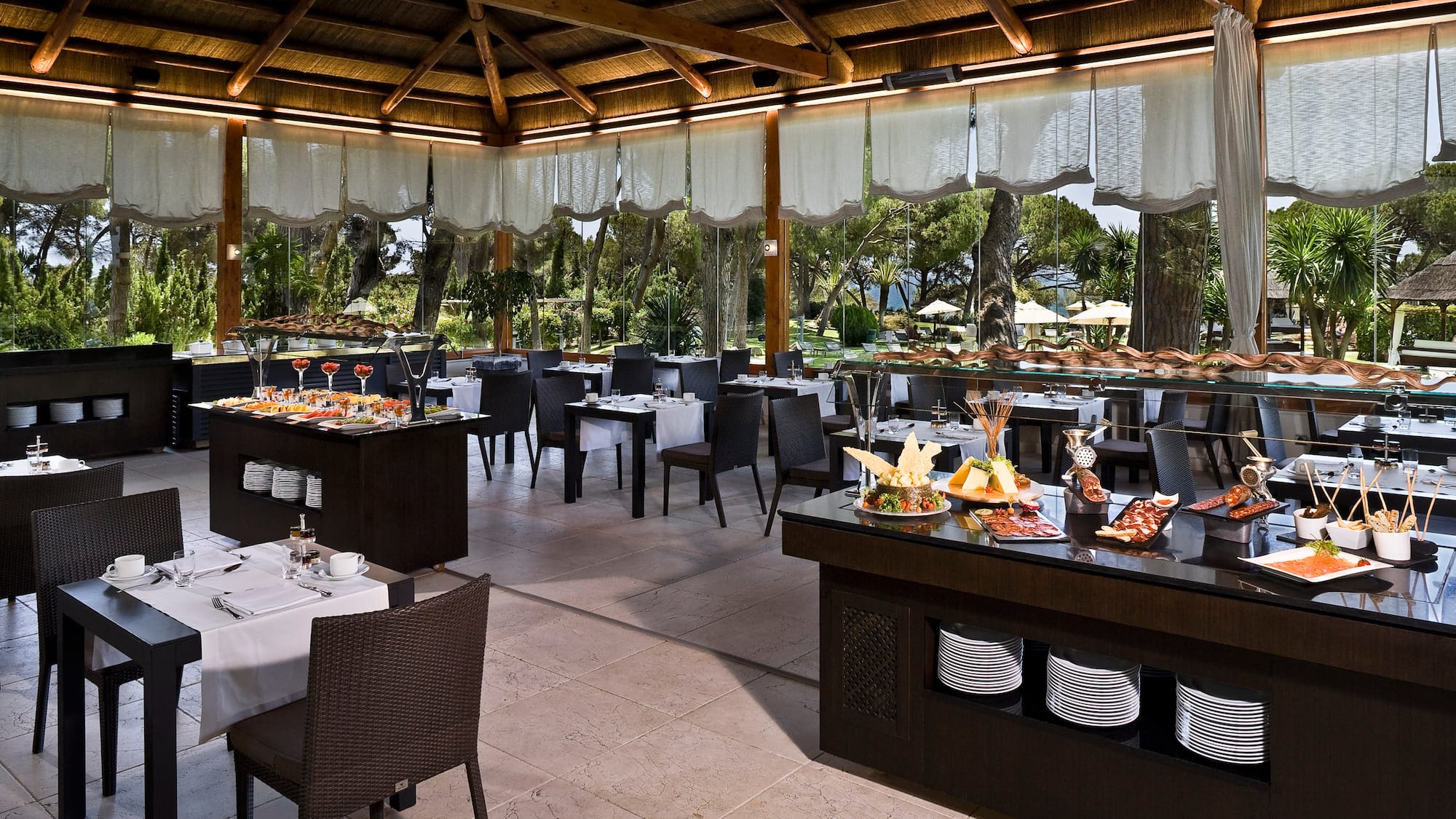 a restaurant with tables and chairs