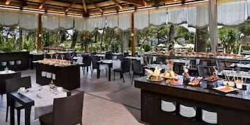 a restaurant with tables and chairs