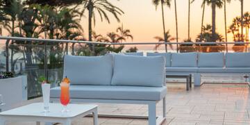 a couches and a table on a patio