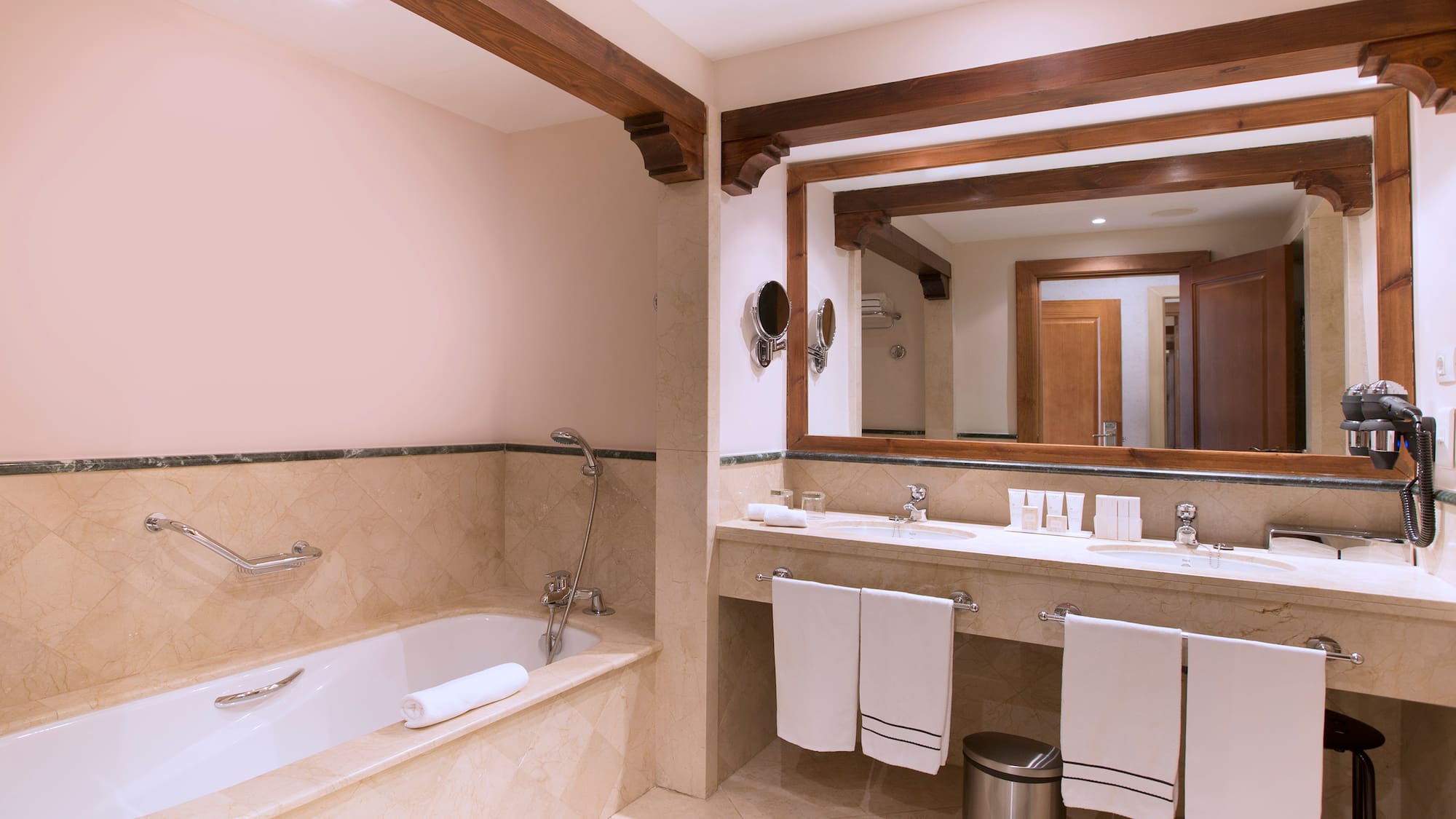 a bathroom with a tub and sink