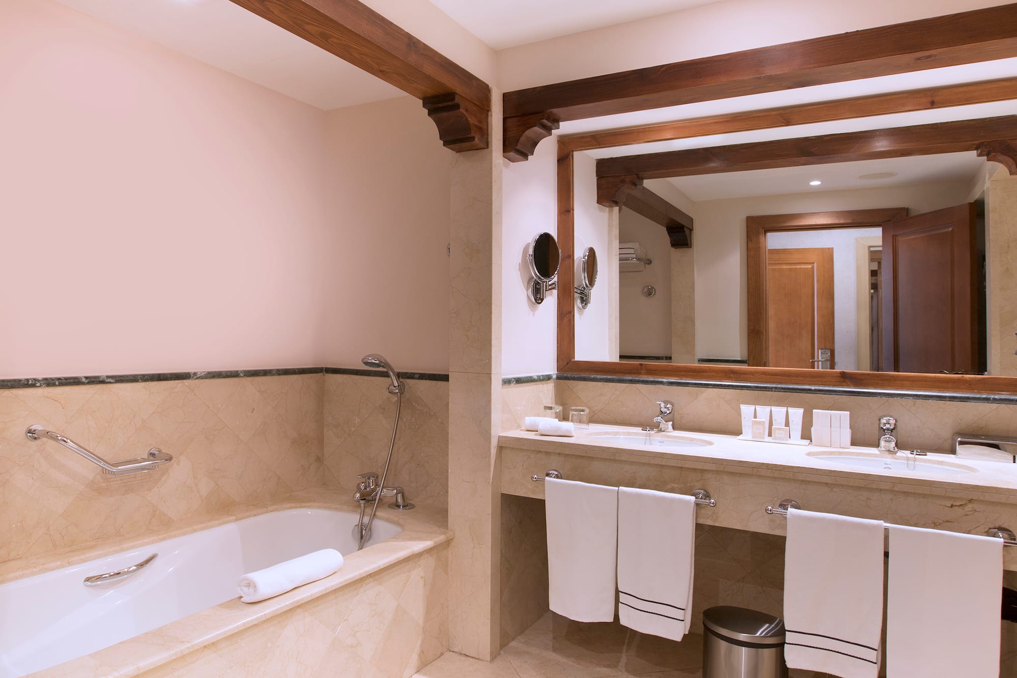 a bathroom with a tub and sink