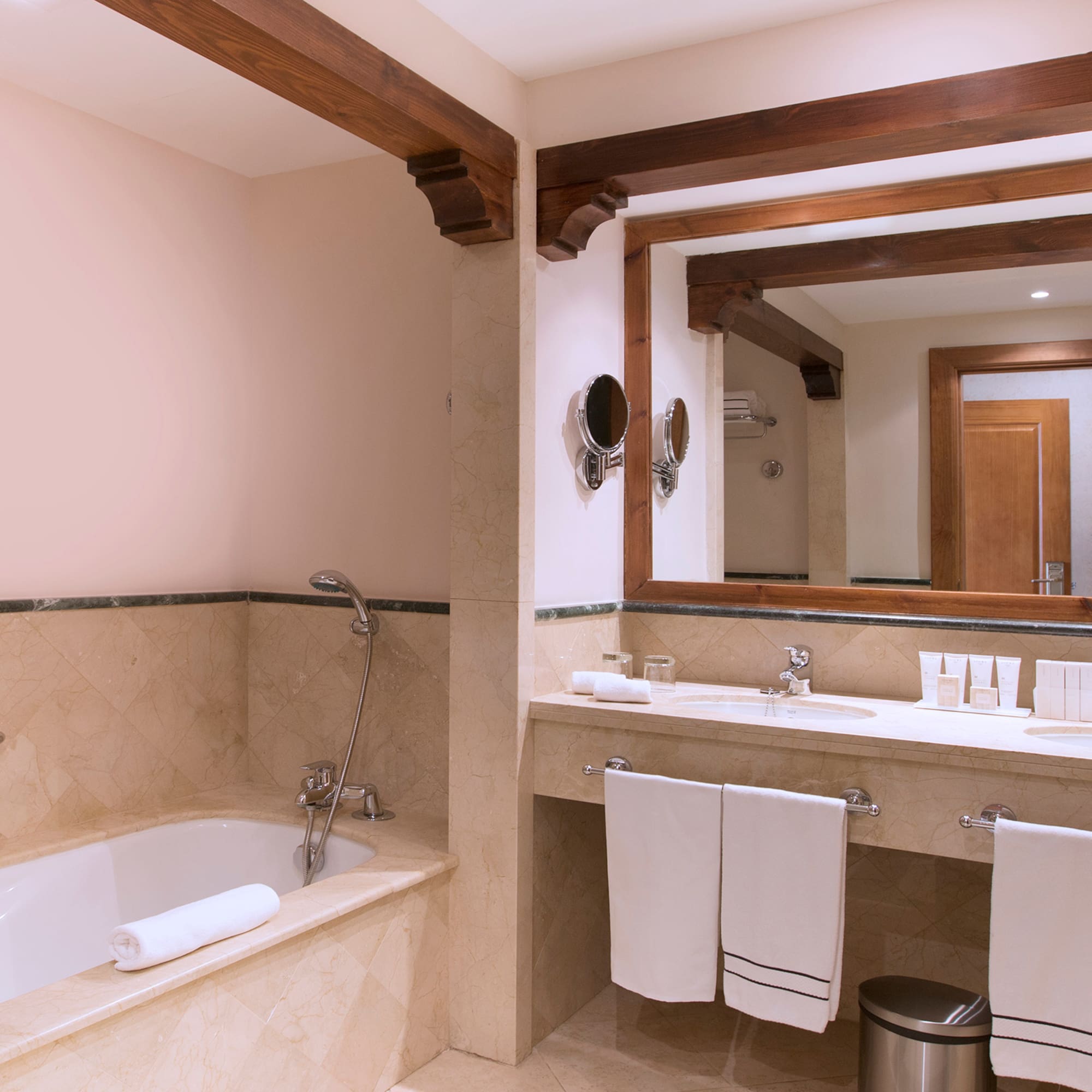 a bathroom with a tub and sink